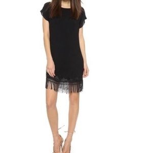 Soft and flowy black fringe hem dress with embroidery